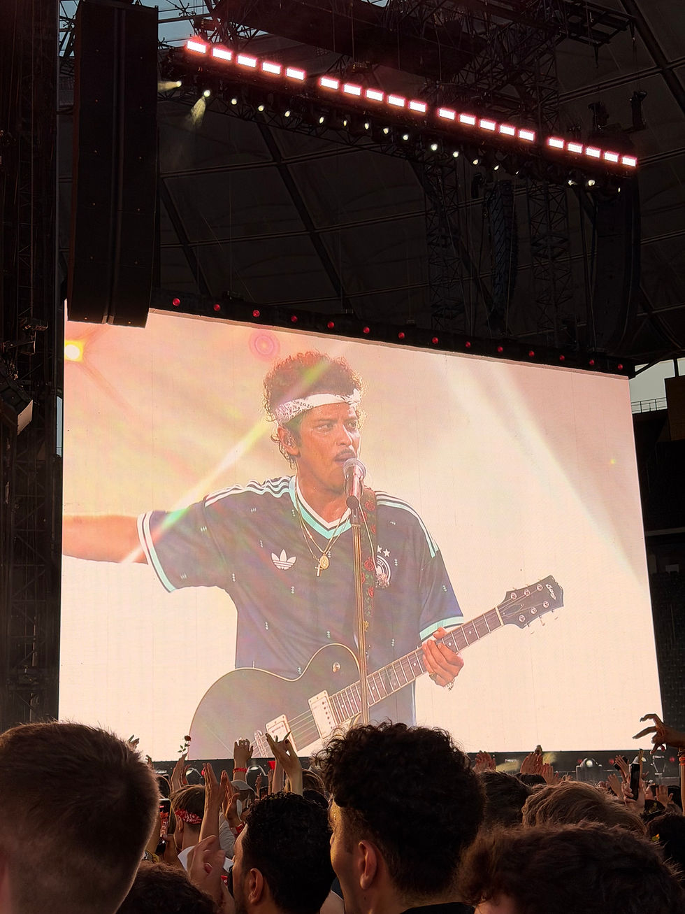 Bruno Mars performing on stage during The Romantic Tour 2026.