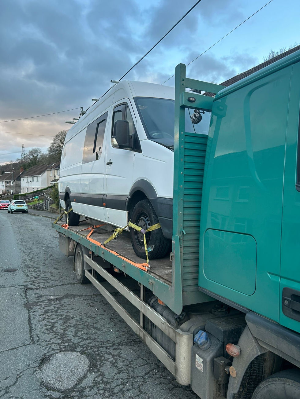 Swansea, vehicle transportation to service garage.