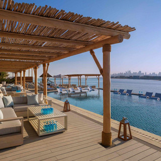 The Beach Bar & Grill by Mauro Colagreco at One & Only Royal Mirage. Luxury Outdoor Furniture supplied from DEDON and BIVAQ. Project Developed By NextSpace.