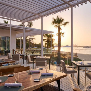 The Beach Bar & Grill by Mauro Colagreco at One & Only Royal Mirage. Luxury Outdoor Furniture supplied from DEDON and BIVAQ. Project Developed By NextSpace.