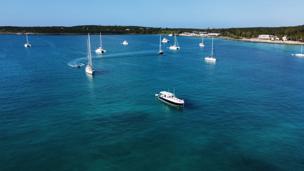Sailers dock at the famous Cupids Cay for warm summer days