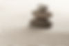 stacked-zen-stones-sand-background-art-balance-concept.jpg