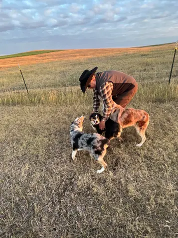 Tracy and 3 dogs.webp