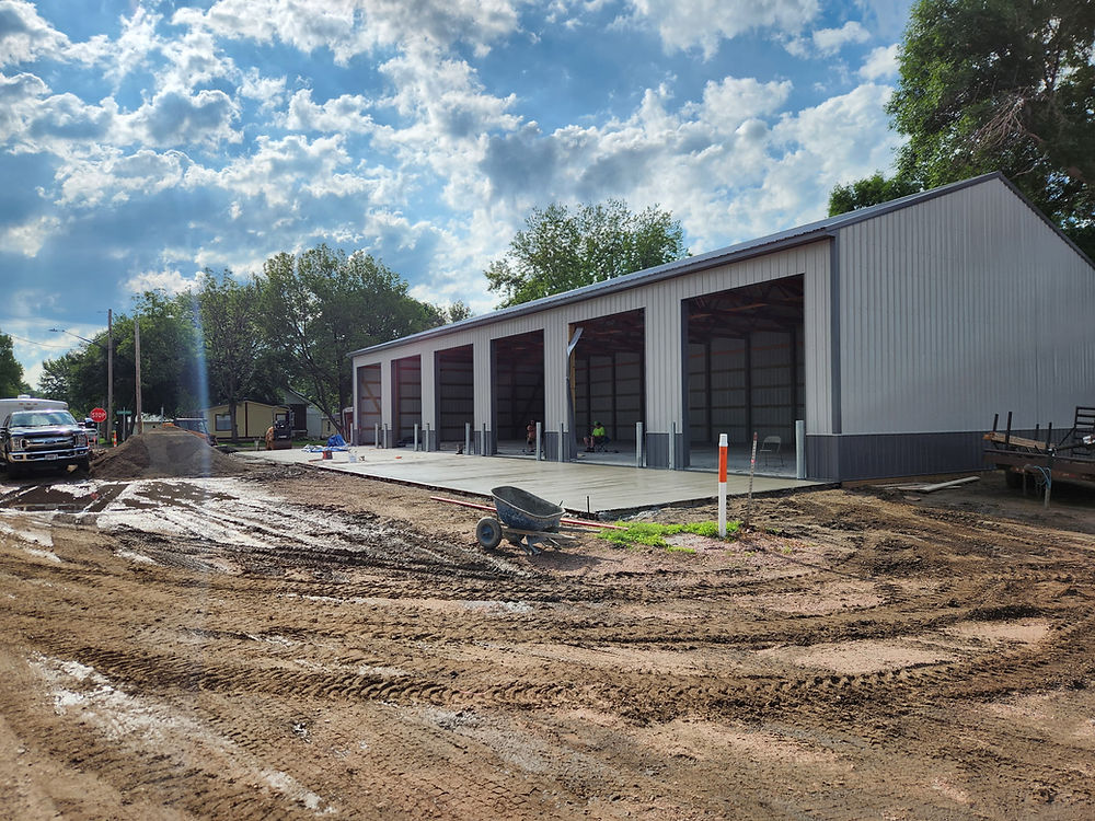 concrete apron in front of commercial shop spaces cured and ready to go