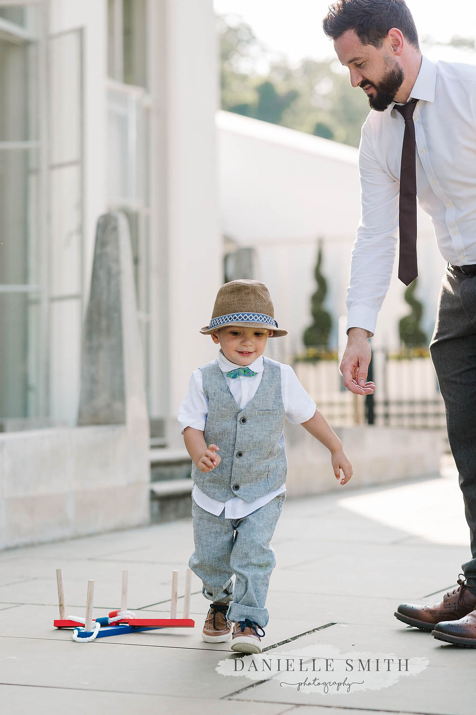little boy with dad at wedding