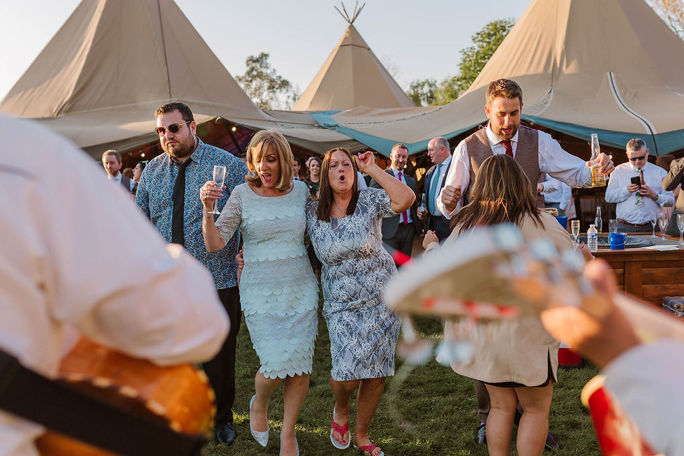 mums dancing at tipi wedding