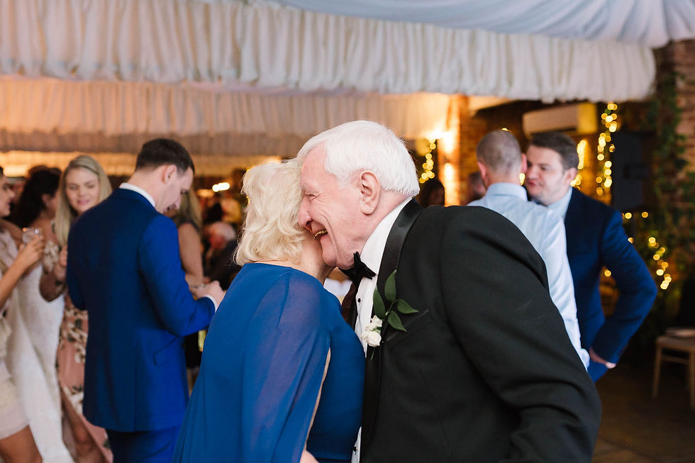 grandparents dancing at wedding