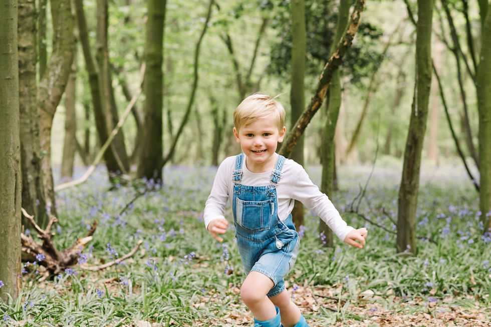 natural photo of little boy running