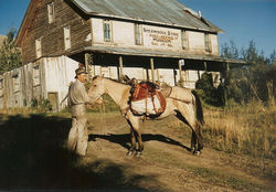 1949 Gil Day in front of Sherwood's Store Museum and P.O.