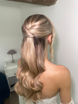 Half up and half down soft bridal wave