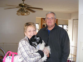 Happy families with their new puppy
