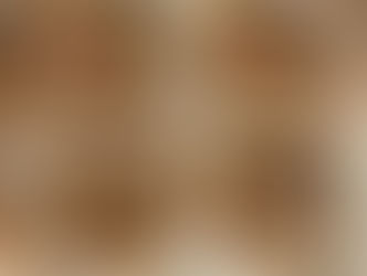 close‑up of banana bread cinnamon roll topped with icing