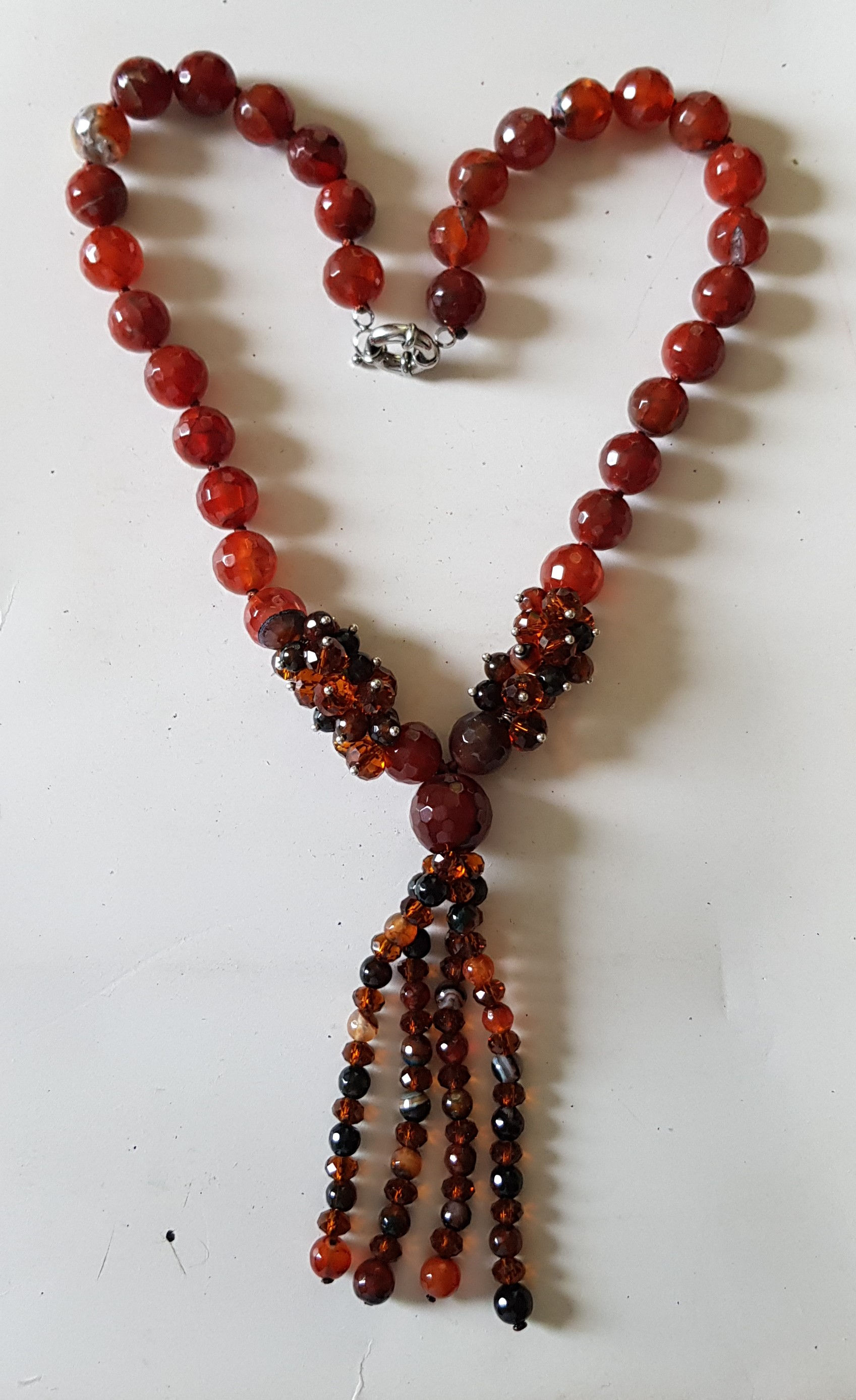 Collana con palline sfaccettate ambrate