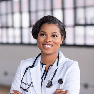 nurse practitioner posing for brand photography session in cleveland studio
