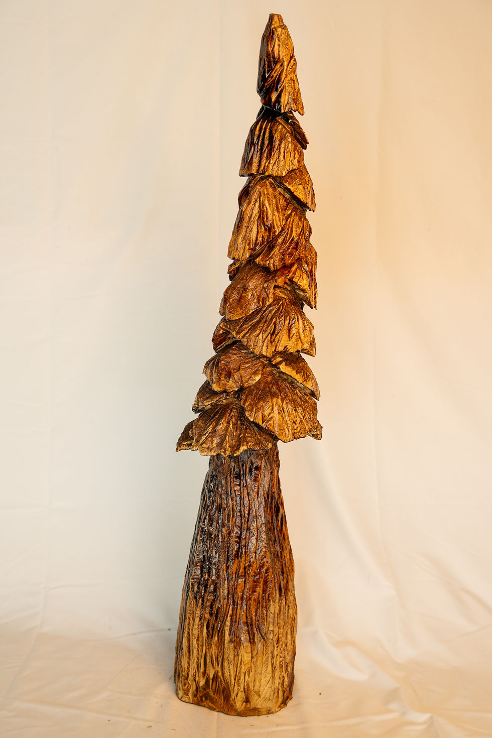 Thumbnail: Towering evergreens and rugged forests of the Pacific Northwest, this handcrafted tree carving celebrates nat