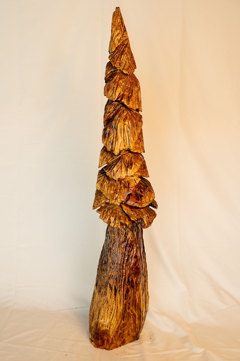 Thumbnail: Towering evergreens and rugged forests of the Pacific Northwest, this handcrafted tree carving celebrates nat