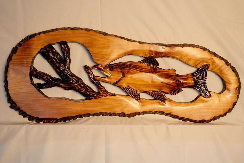 This carving captures salon run tradition, and the beauty of the natural world through authentic chainsaw craftsmanship.