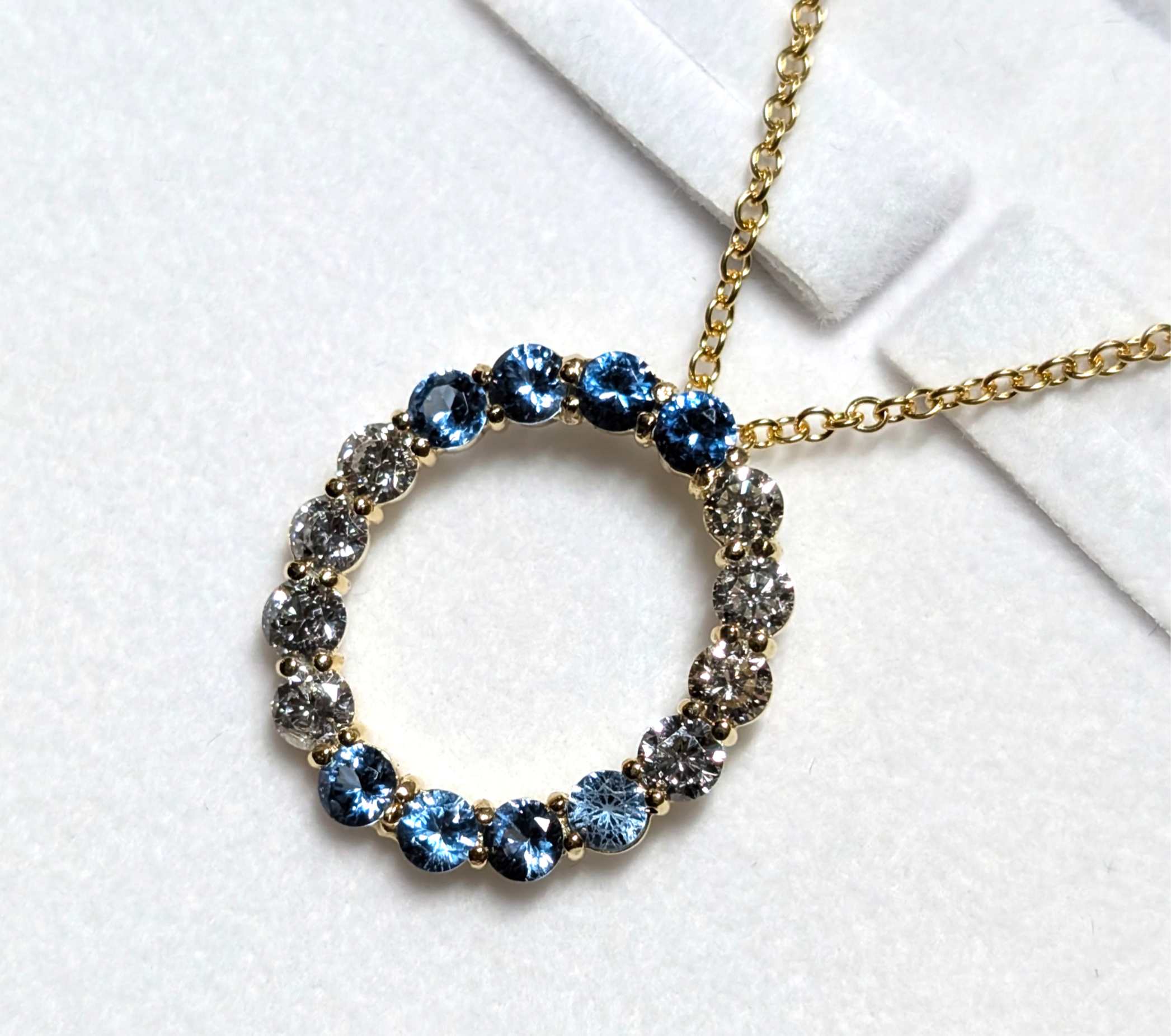 Genuine Blue Topaz and Diamond Pendant