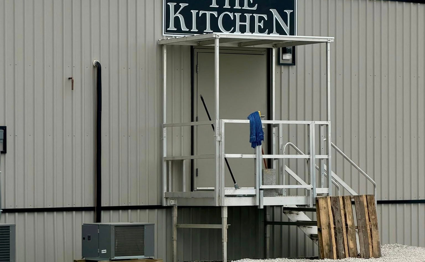 The Kitchen building with custom signs Monroe LA.