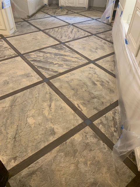 Decorative concrete floor project, grid pattern