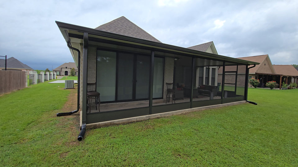 Screened patio addition with black frame