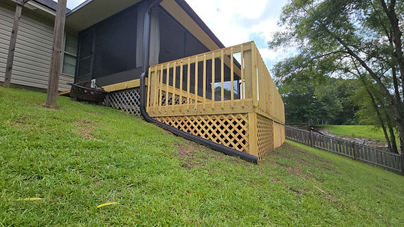 Wooden deck stairs leading to house