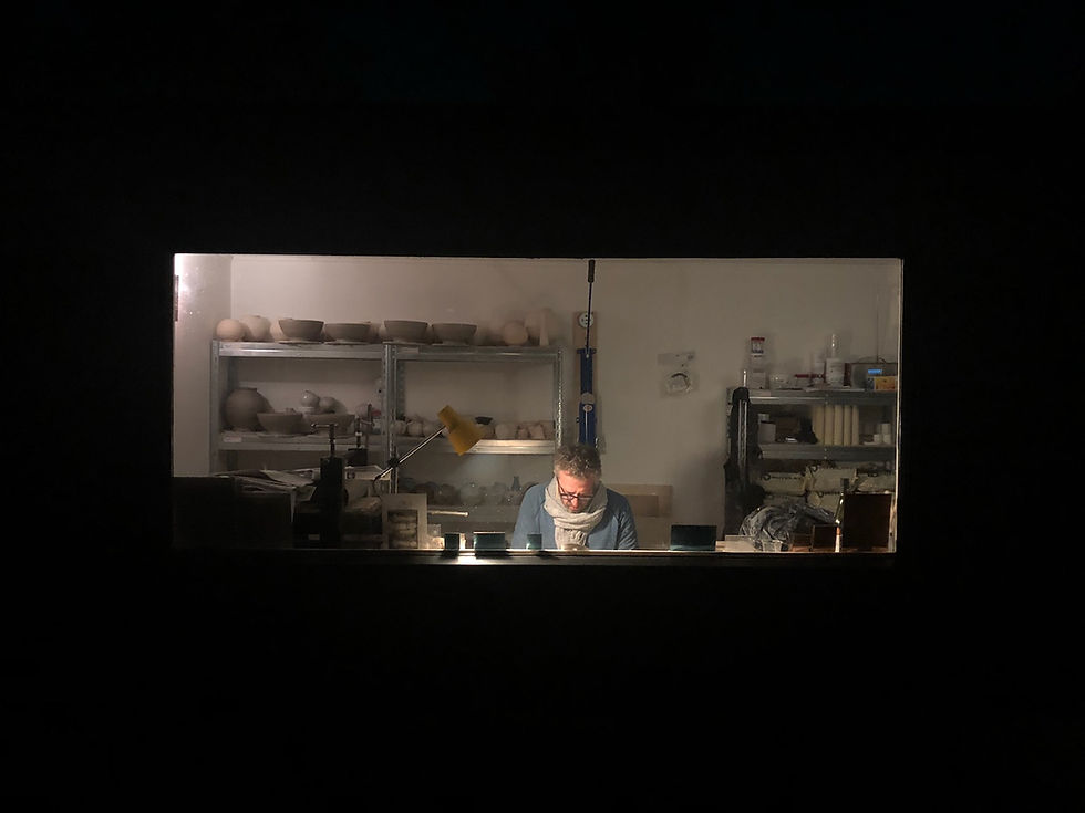 Ian-burgess-working-in-his-pottery-studio