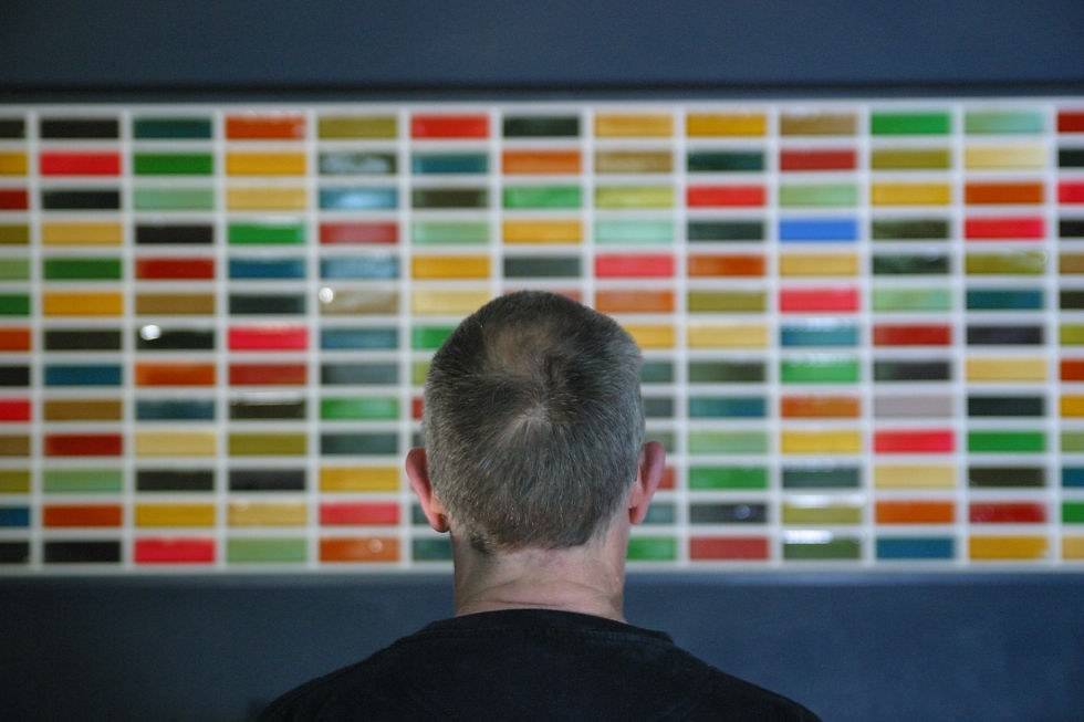 Ian-burgess-looking-at-his-block-painting