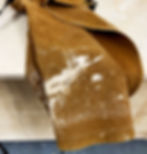 Apron-covered-in-clay