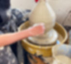 Ian-Burgess-making-a-pot-on-a-pottery-wheel