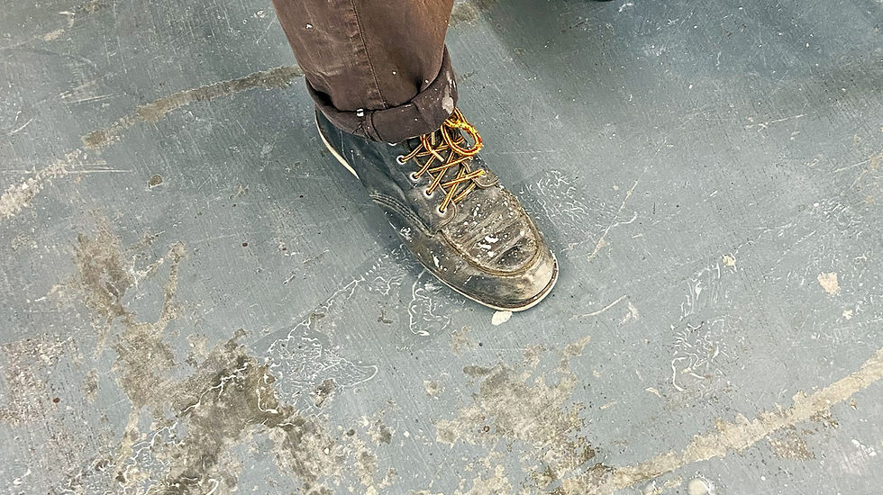 Ian-Burgess's-redwing-boot-splattered-in-clay