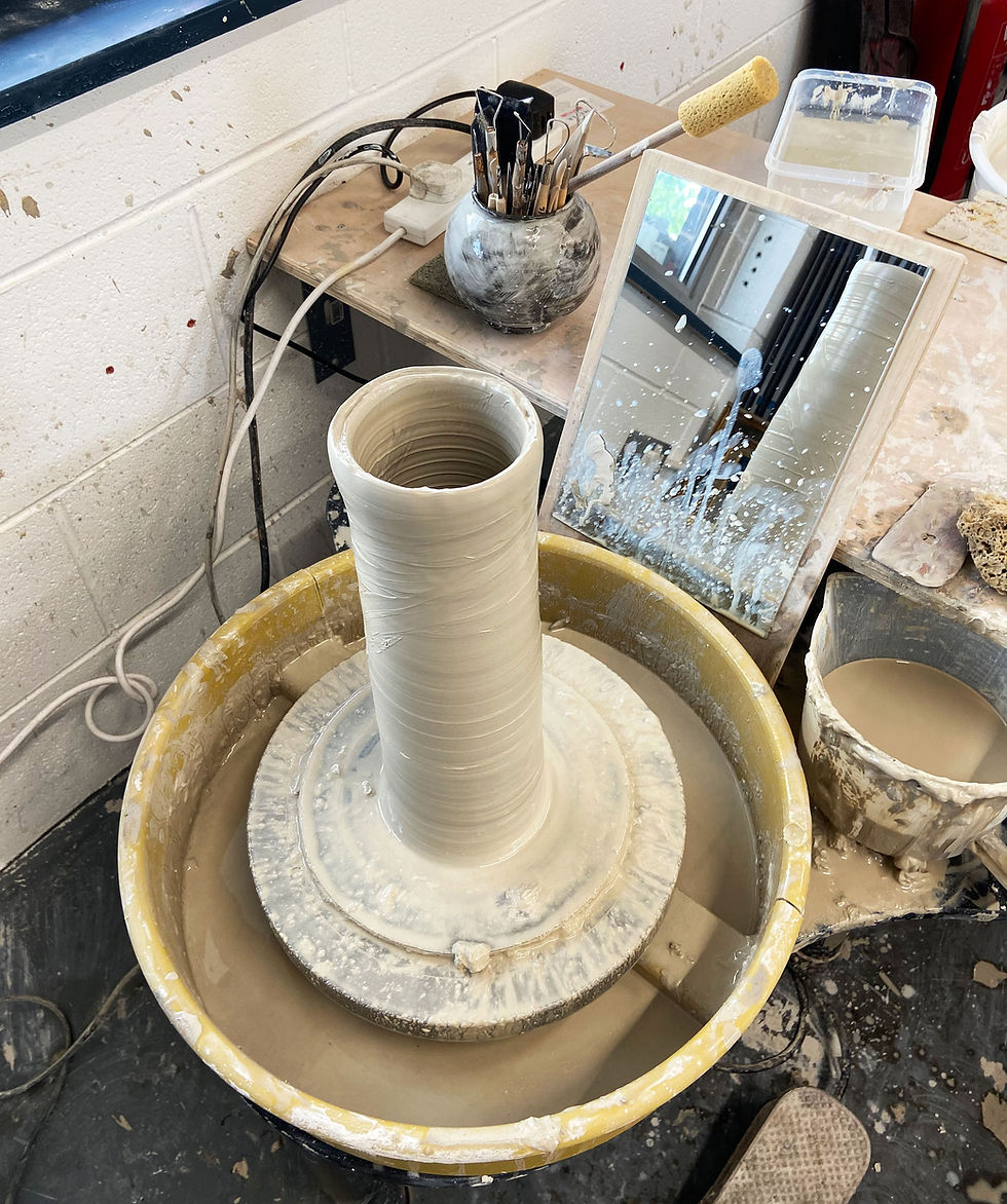 Tall-pot-on-a-pottery-wheel