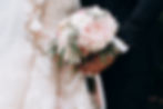 groom-bride-together-are-holding-wedding-pink-bouquet.jpg