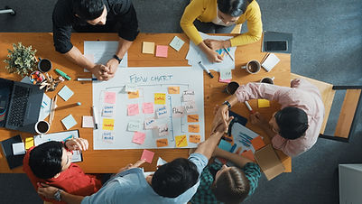 top-view-smart-team-making-kanban-while-writing-task-board-convocation.jpg