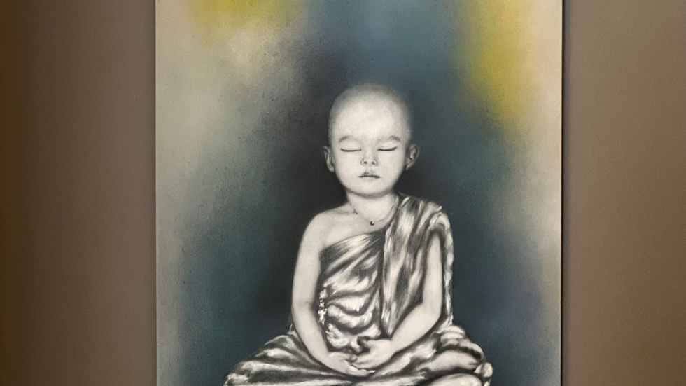 a painting of a baby in a lotus position with his eyes closed