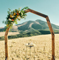Barn Arch with Fresh Floral Arrangement