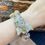 Thumbnail: Bamboo Agate Arowana over all good  Luck charm bracelet