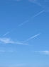 blue sky with cloud streaks