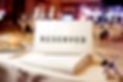 Reserved sign on a table in restaurant.jpg