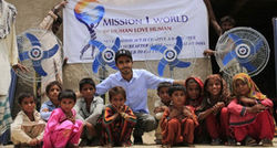 Muhammad with villagers in Sanghar, Sindh