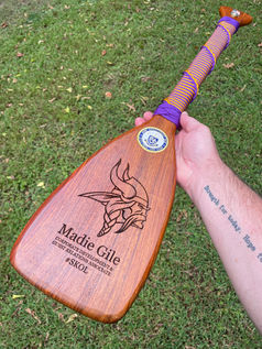 Engraved paddle for a Vikings employee