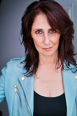 Jude Roth actor headshot drama light blue leather coat