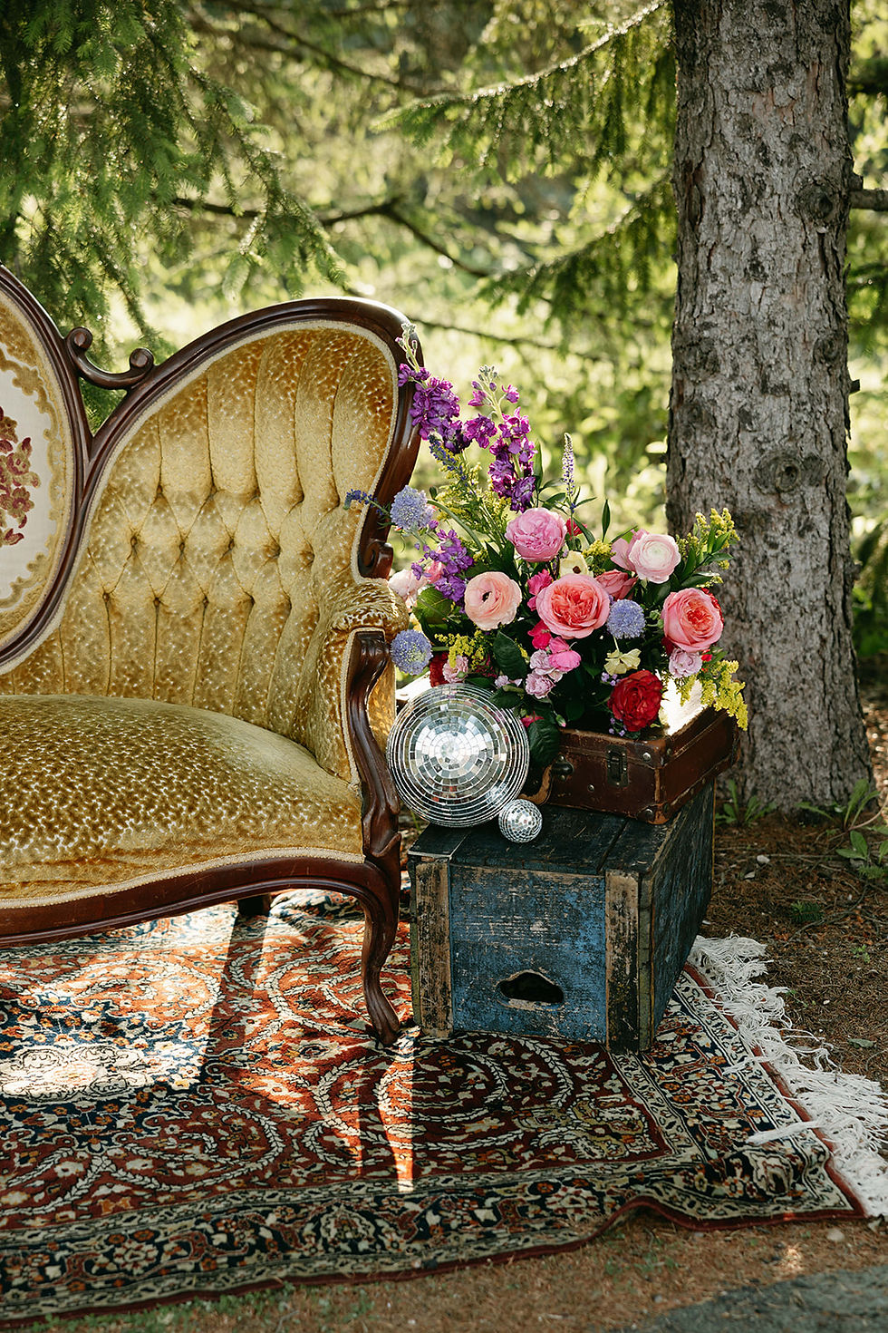 Vintage gold settee with bright colorful wedding florals at Abloom Farm in Saukville Wisconsin