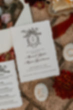 Invitation suite with stationery, accessories, and wedding details photographed at Abloom Farm