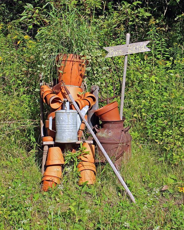 Figure made of flower pots along Rustic Road 16 in Manitowoc County