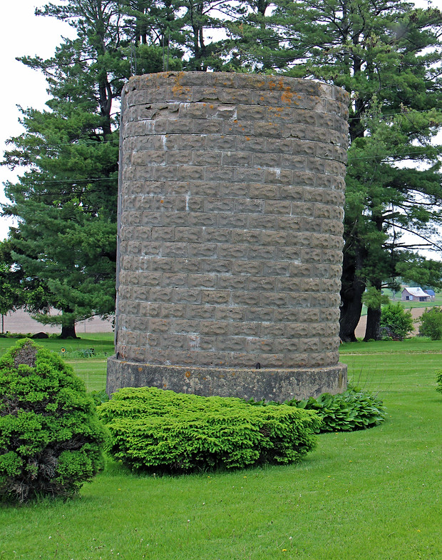 Base of concrete silo along Rustic Road 51 in Pierce County