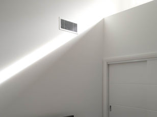 Affordable dwelling with a split skillion roof, which creates interesting opportunities for raked ceilings, clerestory windows and a light-shelf feature.