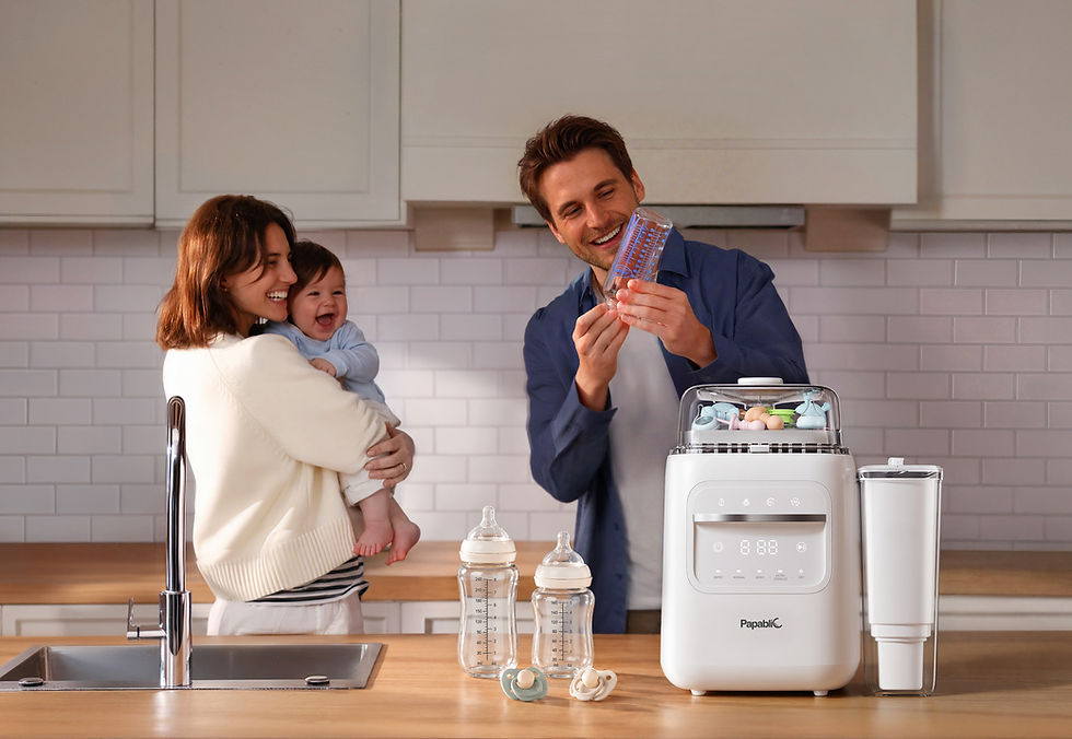Happy family in bright modern kitchen with Papablic SafeguardPlus™ Smart Feeding System Plus