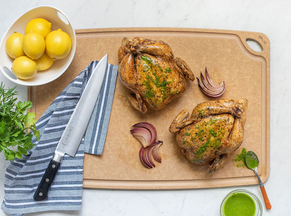 Sage 24" x 16" carving board with food