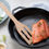 Thumbnail: Pan-seared salmon fillet in cast iron skillet with Sage turner tool